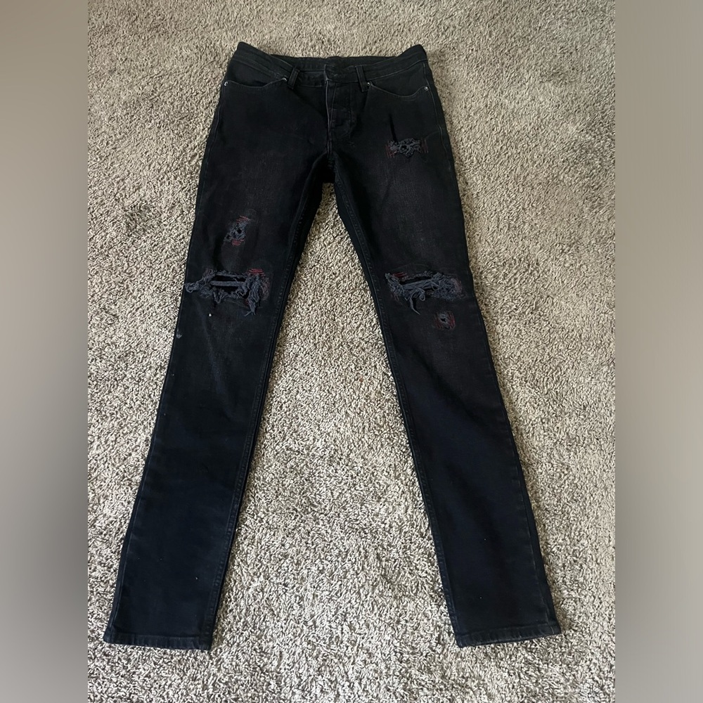 Black van wrinkle red bottled thrashed Ksubi jeans